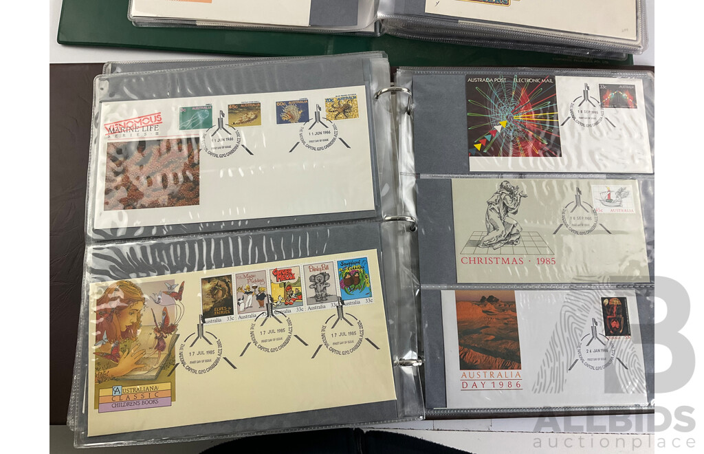 Two Albums of Australian 1970-80's First Day Covers and Stamp Packs Including 1984 Christmas, AUSIPEX, Conservation, Selected Issues, 1982 QE2 Birthday, Antarctic Territory and More