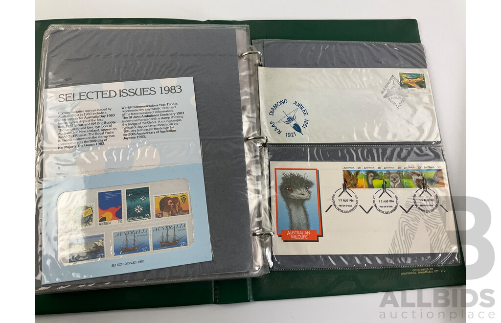 Two Albums of Australian 1970-80's First Day Covers and Stamp Packs Including 1984 Christmas, AUSIPEX, Conservation, Selected Issues, 1982 QE2 Birthday, Antarctic Territory and More
