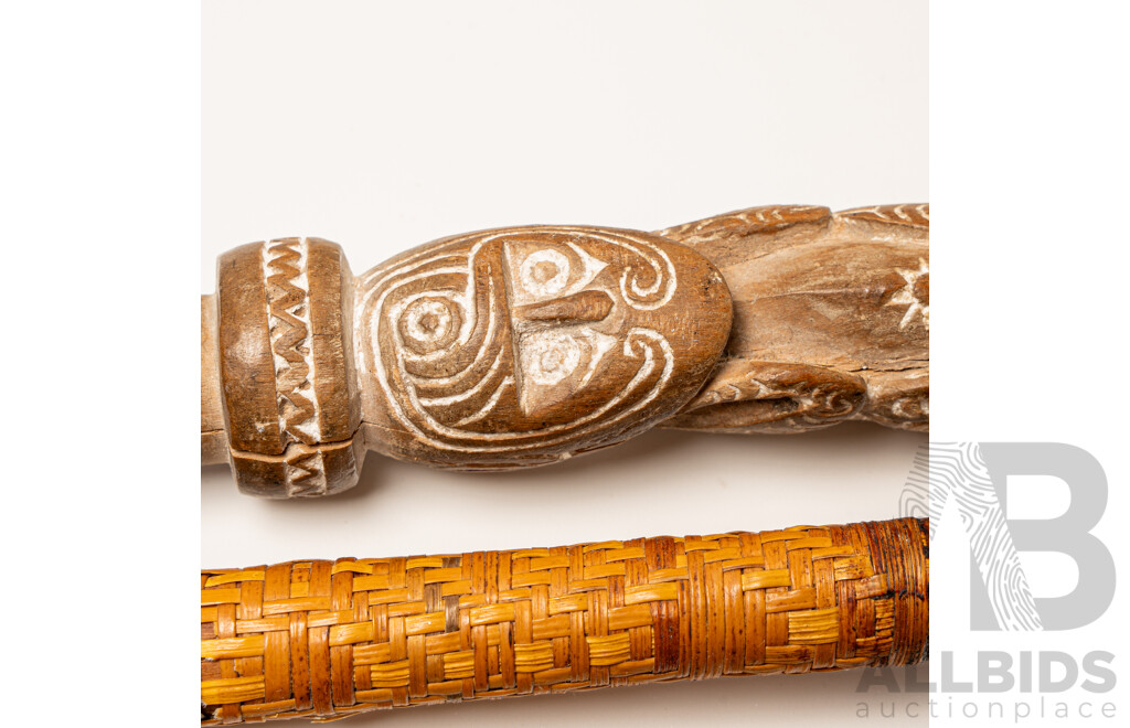 Collection Tribal Walking Staffs Including Two Massim Trobriand Island Examples, Dogs Head Example and Fijian Club
