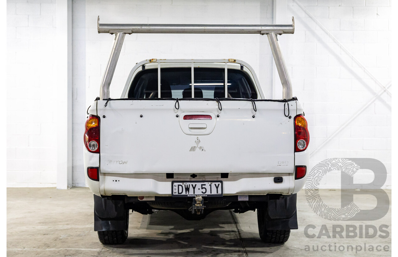7/2014 Mitsubishi Triton GLX (4x4) MN MY15 Double Cab Utility Solid White Turbo Diesel 2.5L