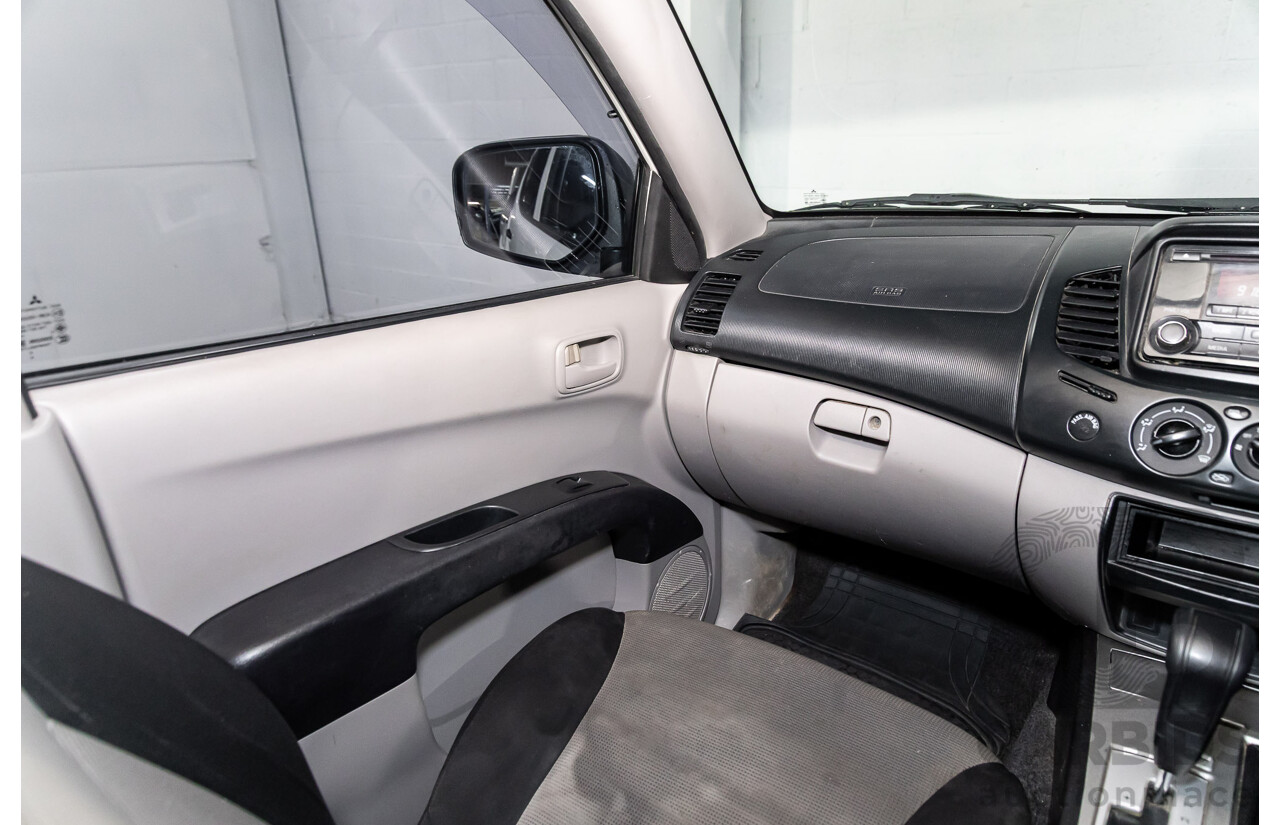 7/2014 Mitsubishi Triton GLX (4x4) MN MY15 Double Cab Utility Solid White Turbo Diesel 2.5L