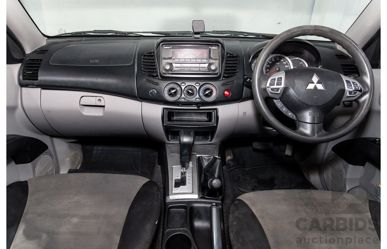 7/2014 Mitsubishi Triton GLX (4x4) MN MY15 Double Cab Utility Solid White Turbo Diesel 2.5L