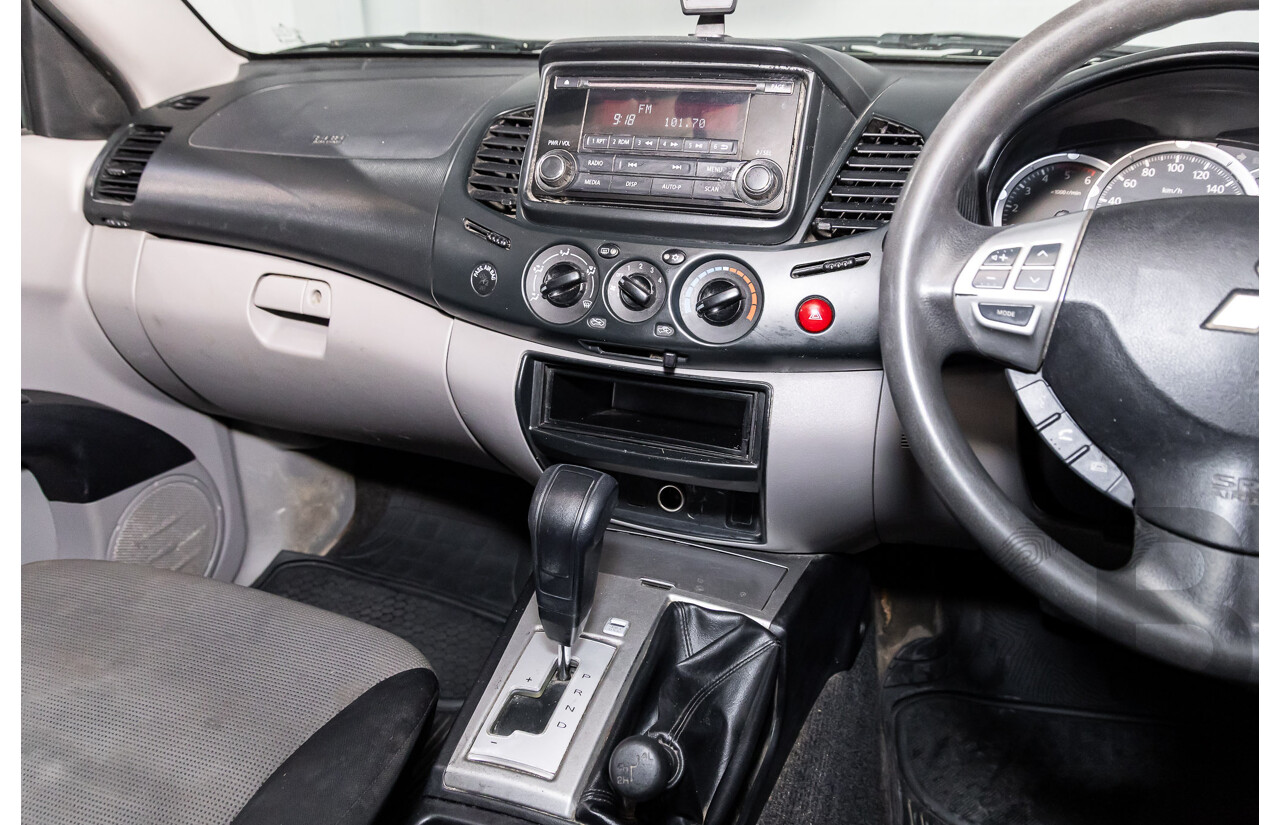 7/2014 Mitsubishi Triton GLX (4x4) MN MY15 Double Cab Utility Solid White Turbo Diesel 2.5L