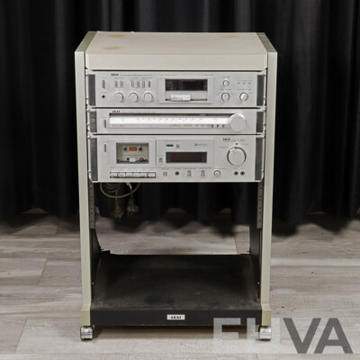 Akai Three Piece Rack Mounted Stereo System Comprising Dc Integrated Amplifier AM UO3, Stereo Tuner at KO2 & Stereo Casette Deck CS MO2, All in Akai Case