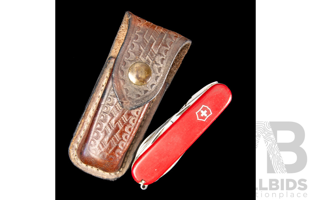 Vintage Swiss Army Knife with Nine Fold Out Features in Leather Belt Pouch