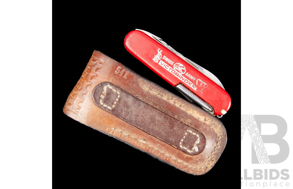 Vintage Swiss Army Knife with Nine Fold Out Features in Leather Belt Pouch