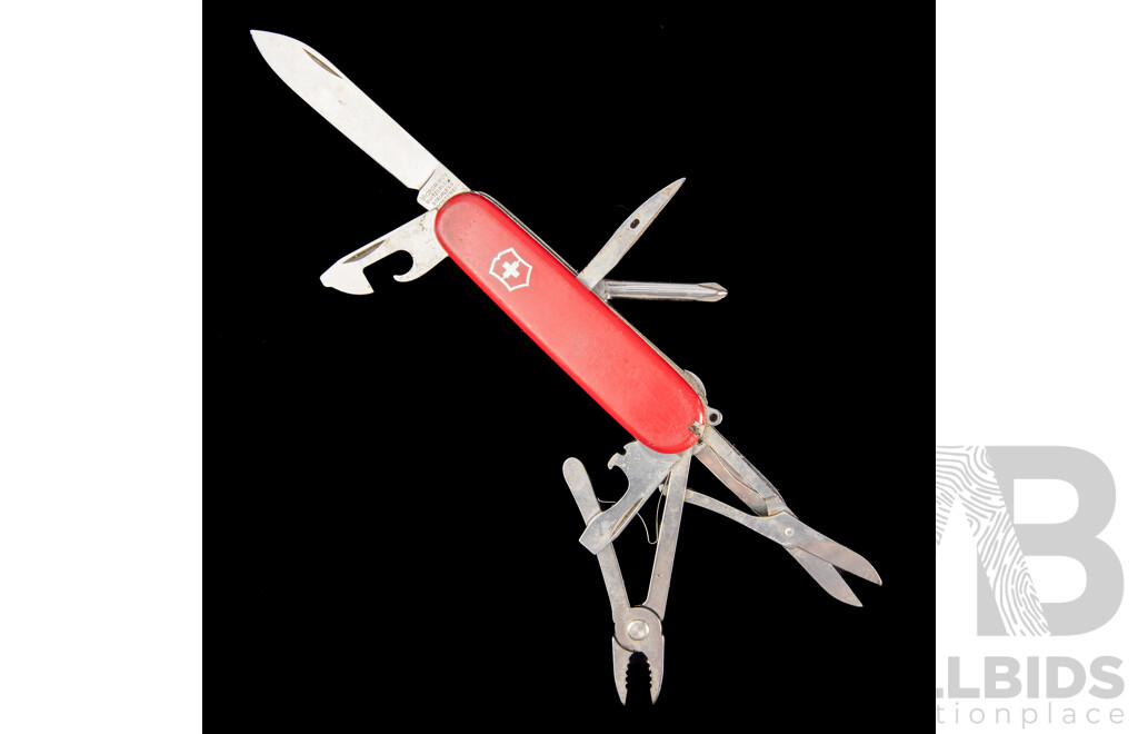 Vintage Swiss Army Knife with Nine Fold Out Features in Leather Belt Pouch