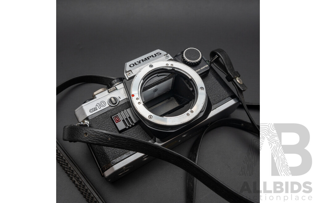 Olympus OM10 with a 50mm F/1.8 Lens and Praktica Super TL3 with Flexar Auto Zoom MC 80-200mm F/4.5 Lens