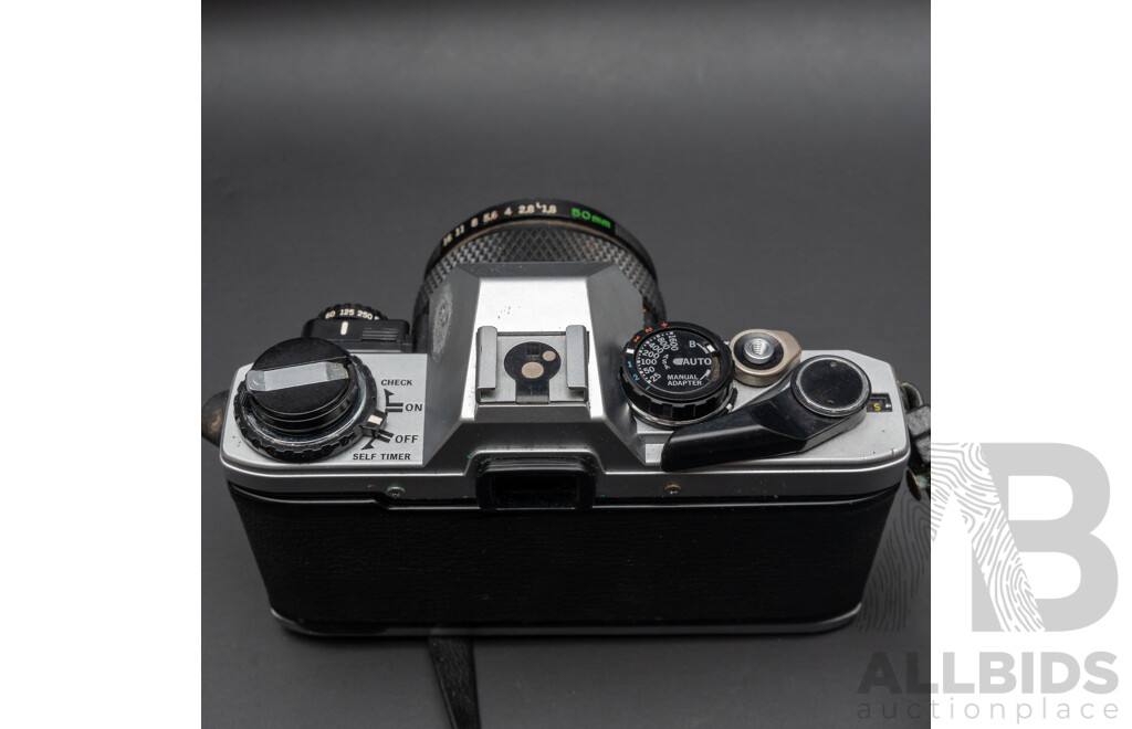 Olympus OM10 with a 50mm F/1.8 Lens and Praktica Super TL3 with Flexar Auto Zoom MC 80-200mm F/4.5 Lens