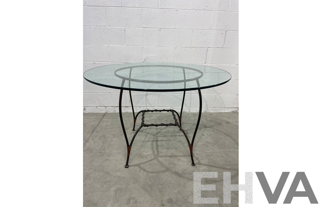Round Glass Table with Base in Wrought Iron