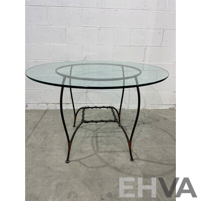 Round Glass Table with Base in Wrought Iron