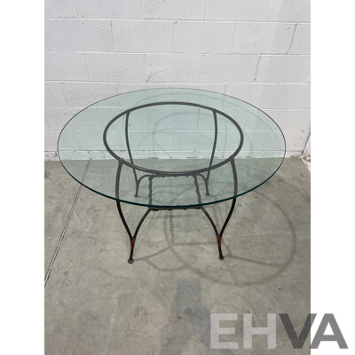 Round Glass Table with Base in Wrought Iron