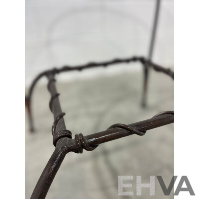 Round Glass Table with Base in Wrought Iron