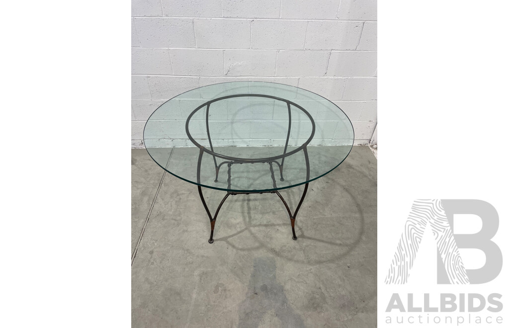 Round Glass Table with Base in Wrought Iron
