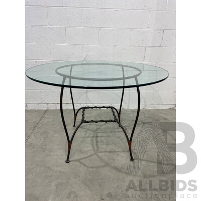 Round Glass Table with Base in Wrought Iron