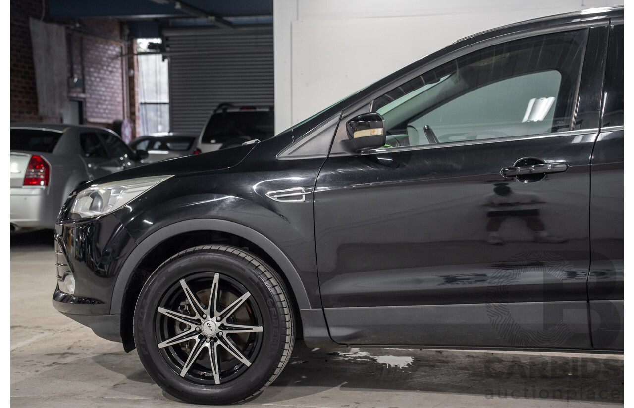 6/2013 Ford Kuga Ambiente (AWD) TF 4d Wagon Panther Black Turbo 1.6L
