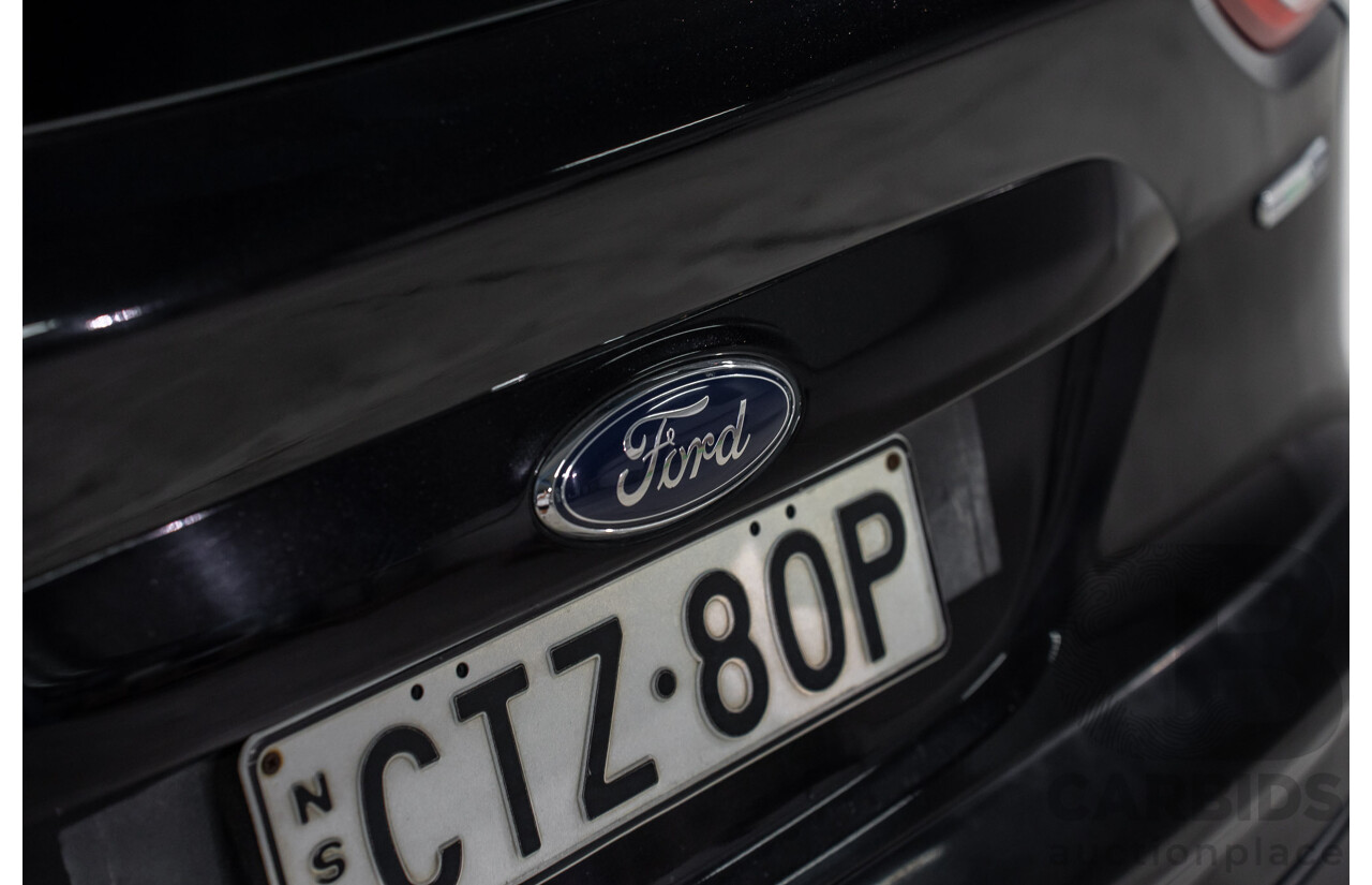 6/2013 Ford Kuga Ambiente (AWD) TF 4d Wagon Panther Black Turbo 1.6L