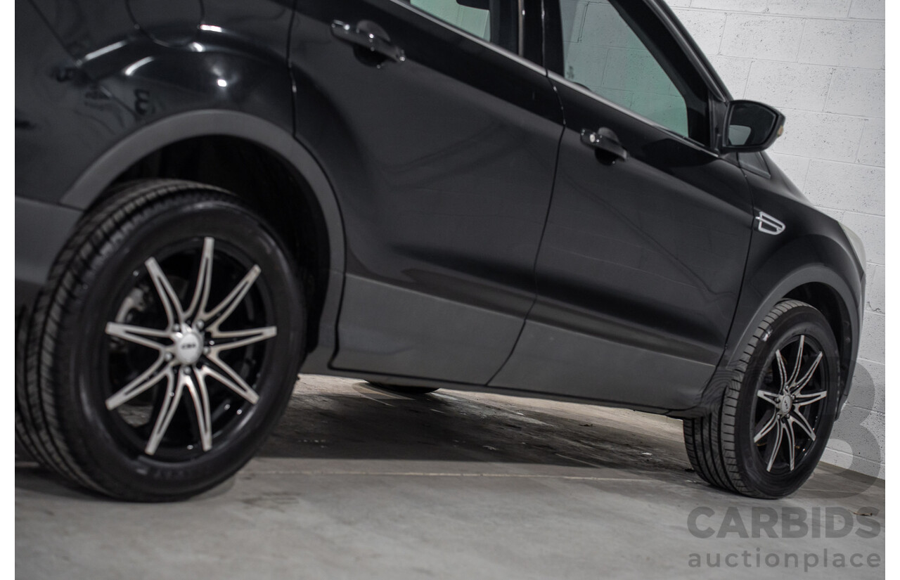 6/2013 Ford Kuga Ambiente (AWD) TF 4d Wagon Panther Black Turbo 1.6L