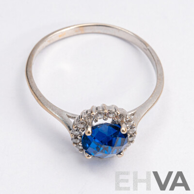 18ct White Gold Sapphire & Diamond Halo Ring, S1.0CT/TDW0.25CT, Size O, 1.93 Grams