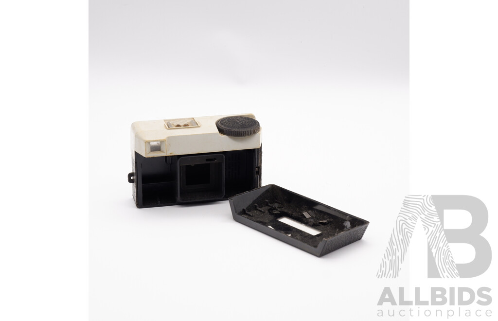 Vintage Kodak Instamatic 25 Camera, Brownie Camera, Two Slide Viewers, Leather Camera Case, Sports Binoculars, and a Flash Unit