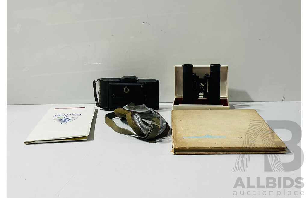 Collection Vintage Items Relating to Travel and Photography Including Pair of Pilots Goggles, the Story of the Nautilus, Pair of Zeiss 10x25B Binoculars and More