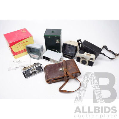 Vintage Kodak Instamatic 25 Camera, Brownie Camera, Two Slide Viewers, Leather Camera Case, Sports Binoculars, and a Flash Unit
