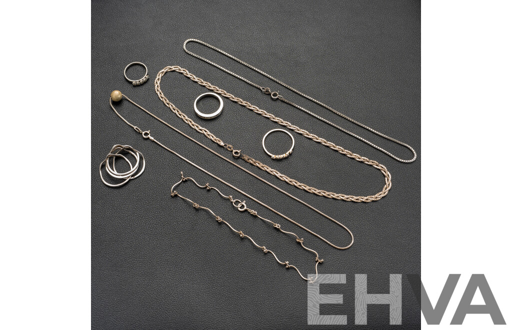Collection of Sterling Silver Necklaces and Rings, 30.78 Grams
