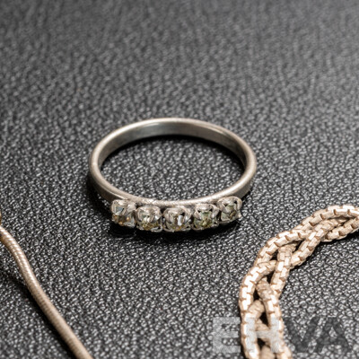 Collection of Sterling Silver Necklaces and Rings, 30.78 Grams