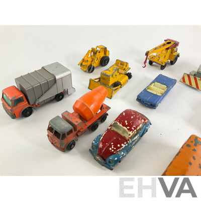 Collection of Vintage Diecast Matchbox Vehicles Including VW, Trucks and Tractors
