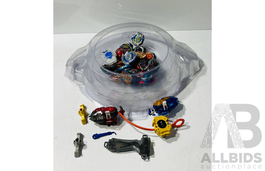 Large Collection of Beyblades and Launchers From Beyblade Bust Along with Transparent Plastic Arena