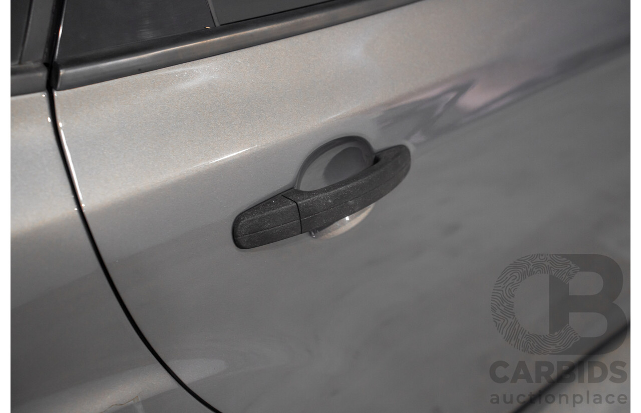 5/2012 Ford Focus Ambiente LW 5d Hatchback Lunar Sky 1.6L