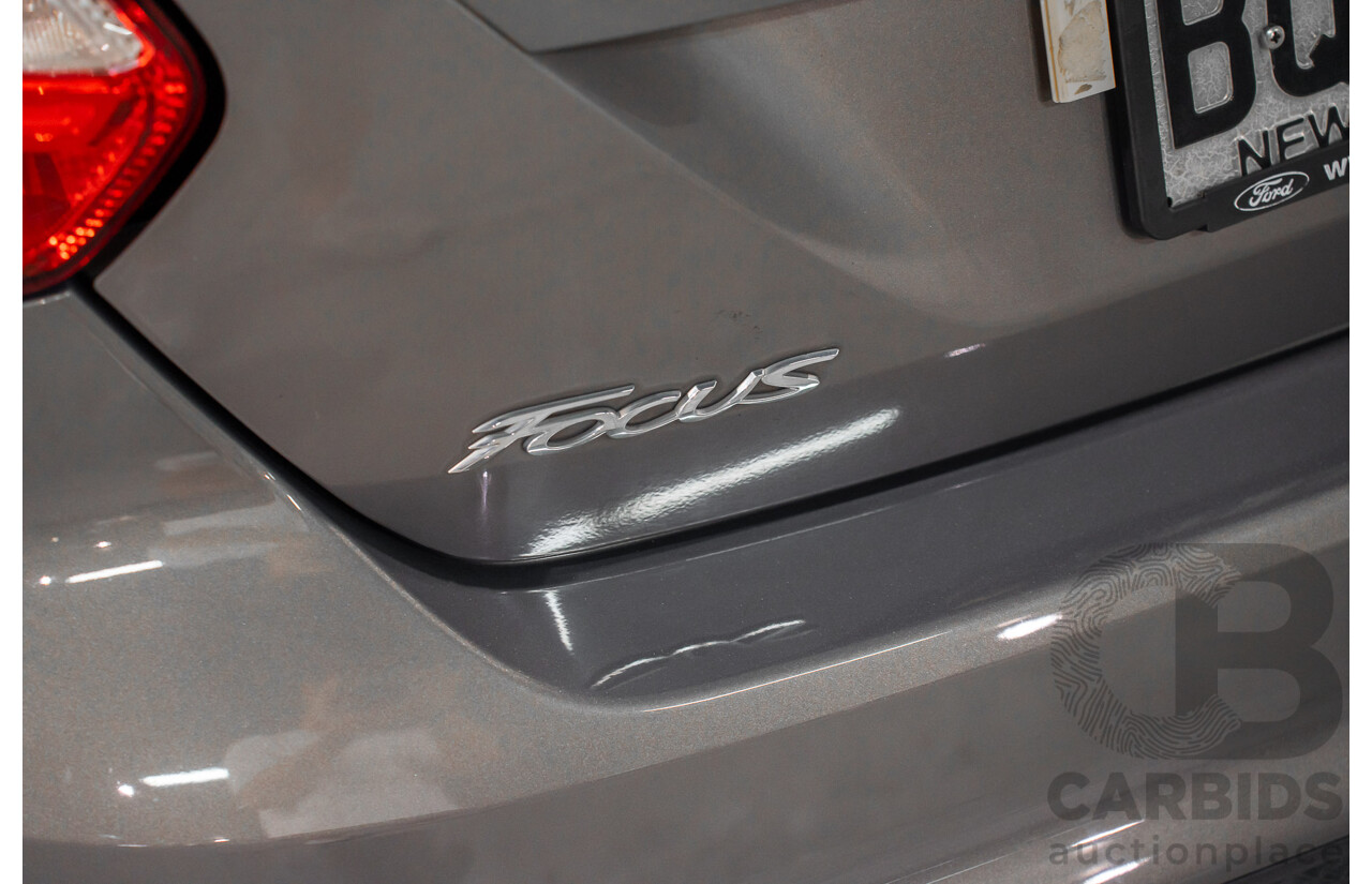 5/2012 Ford Focus Ambiente LW 5d Hatchback Lunar Sky 1.6L