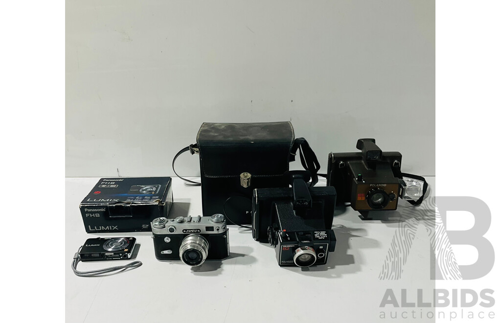 Collection of Vintage Cameras Including Polaroid EE33, Polaroid Colourpack 82 and More
