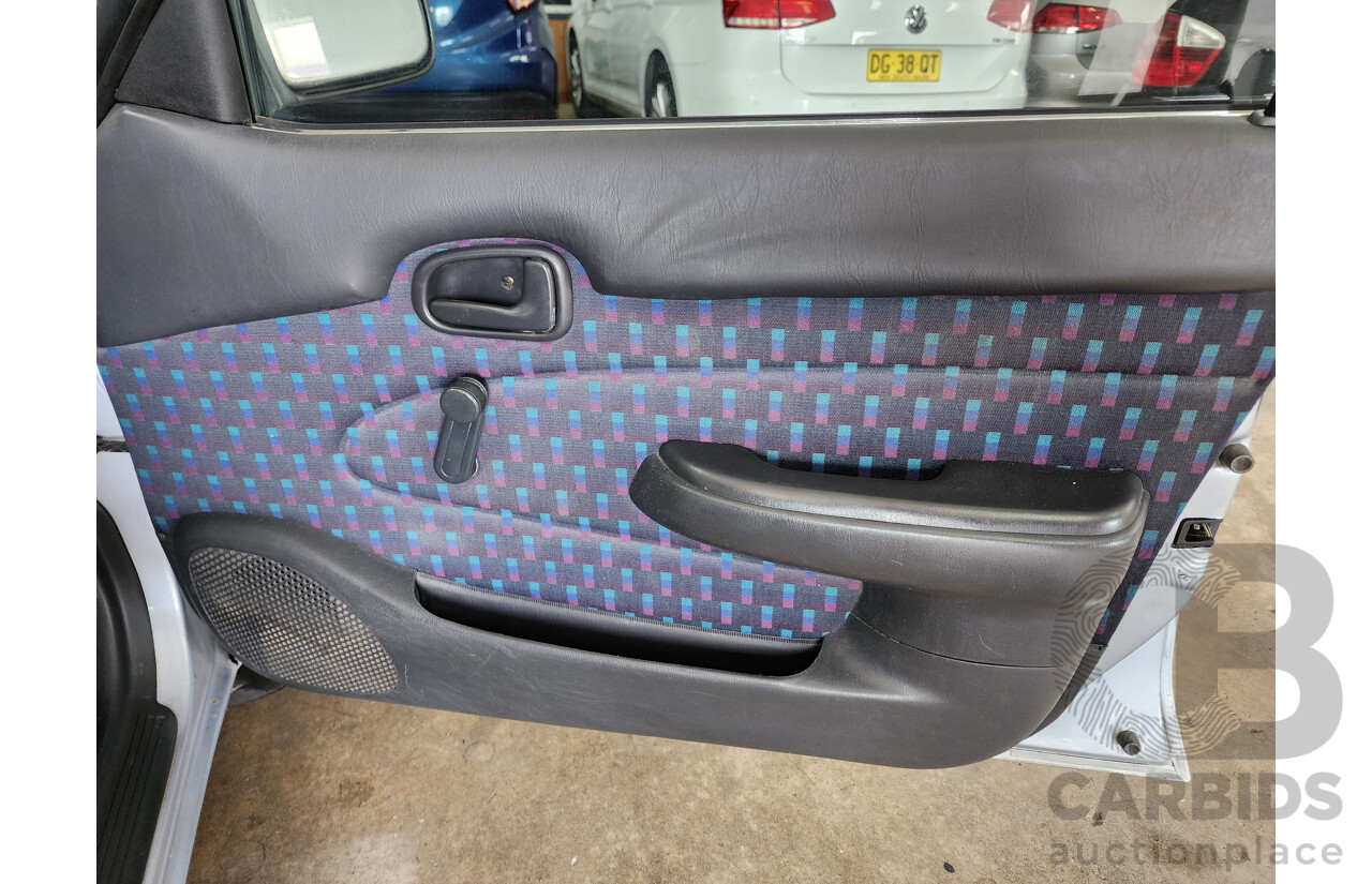 3/1996 Toyota Corolla RV SECA AE102R 5d Liftback Silver 1.8L