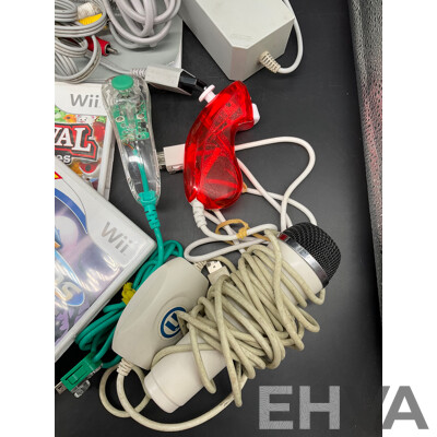 NINTENDO Wii Consoles (RVL-001), Games (x4), Controllers (x3), Nunchucks (x5), Cables and Assorted Accessories