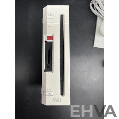 NINTENDO Wii Consoles (RVL-001), Games (x4), Controllers (x3), Nunchucks (x5), Cables and Assorted Accessories