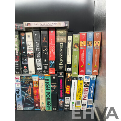 Collection Approx 29 VHS Tapes and 16 DVDs, Assorted Remote Controls