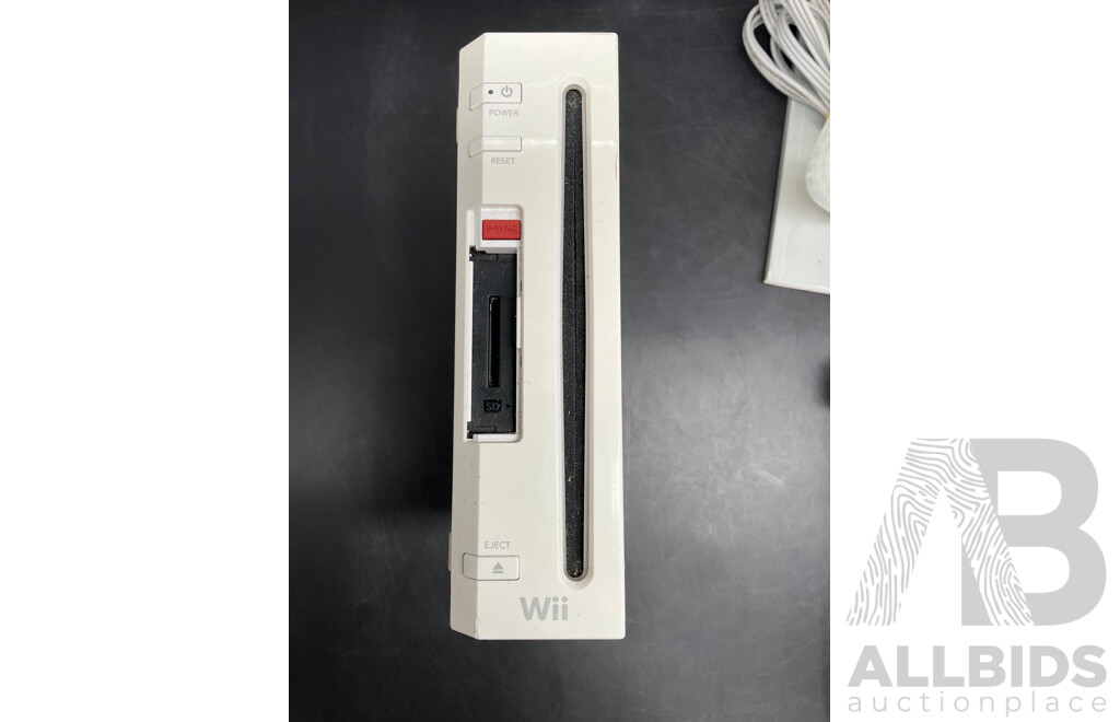 NINTENDO Wii Consoles (RVL-001), Games (x4), Controllers (x3), Nunchucks (x5), Cables and Assorted Accessories