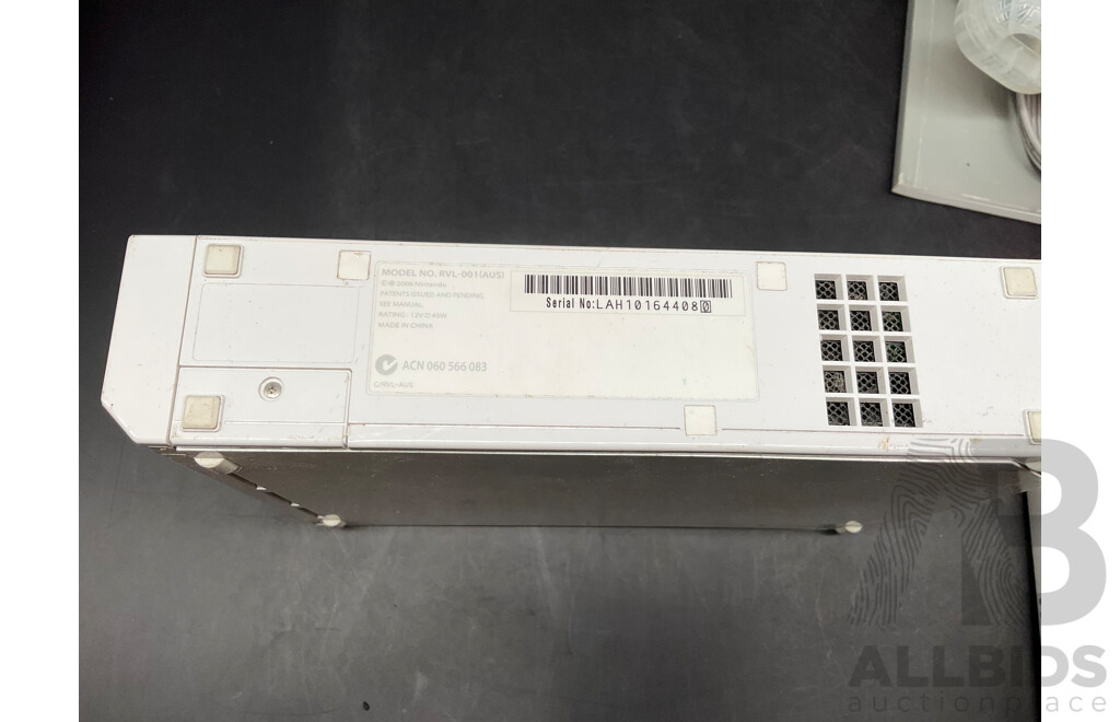 NINTENDO Wii Consoles (RVL-001), Games (x4), Controllers (x3), Nunchucks (x5), Cables and Assorted Accessories