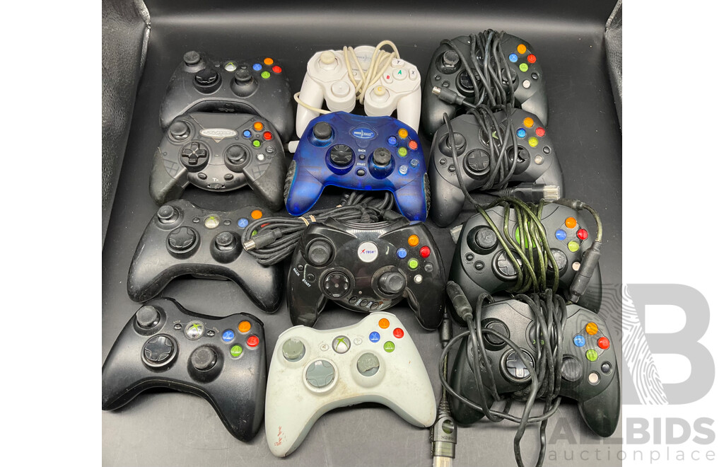 Assortment Xbox Controllers Including Xbox Steering Wheel, Skylanders Xbox Portal, Joytech Original Xbox Receiver, Xbox Remote Control and Wired and Wireless Controllers (x12)