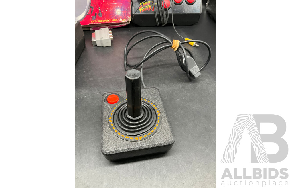 Assorted RETRO Video Games Joysticks and Sanyo CD Player - Lot of 4
