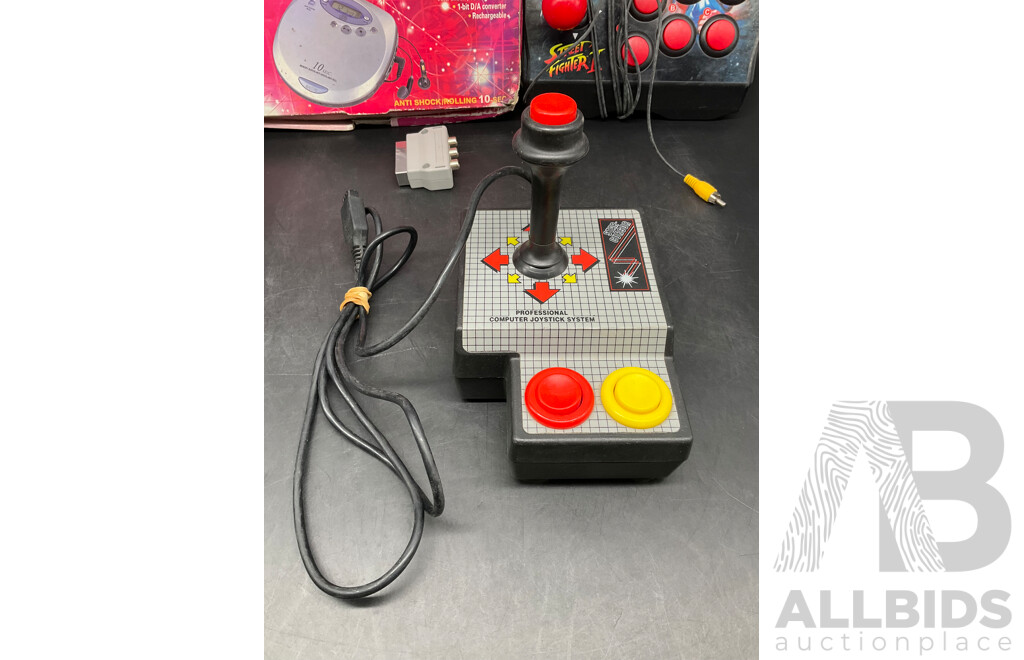 Assorted RETRO Video Games Joysticks and Sanyo CD Player - Lot of 4