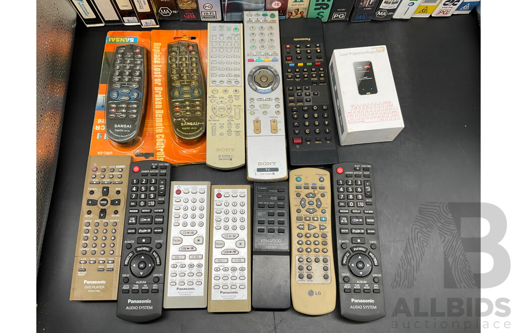 Collection Approx 29 VHS Tapes and 16 DVDs, Assorted Remote Controls
