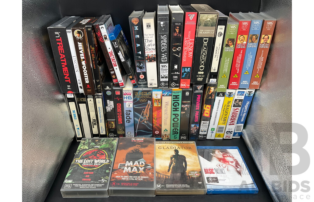 Collection Approx 29 VHS Tapes and 16 DVDs, Assorted Remote Controls