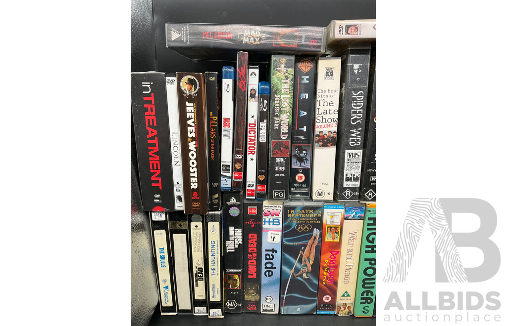 Collection Approx 29 VHS Tapes and 16 DVDs, Assorted Remote Controls