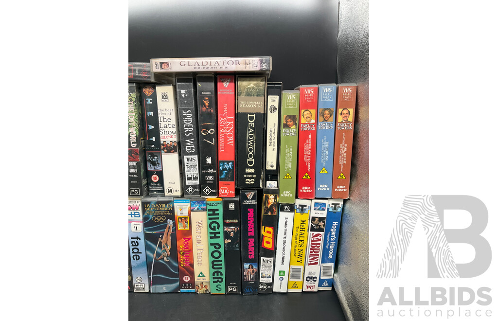Collection Approx 29 VHS Tapes and 16 DVDs, Assorted Remote Controls