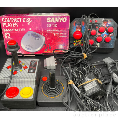 Assorted RETRO Video Games Joysticks and Sanyo CD Player - Lot of 4