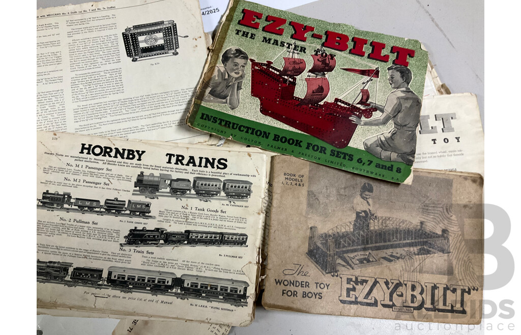 Bulk Lot of Ezy-Build Parts and Construction Books, Including Electric Motor, Wheels, Pulleys and More