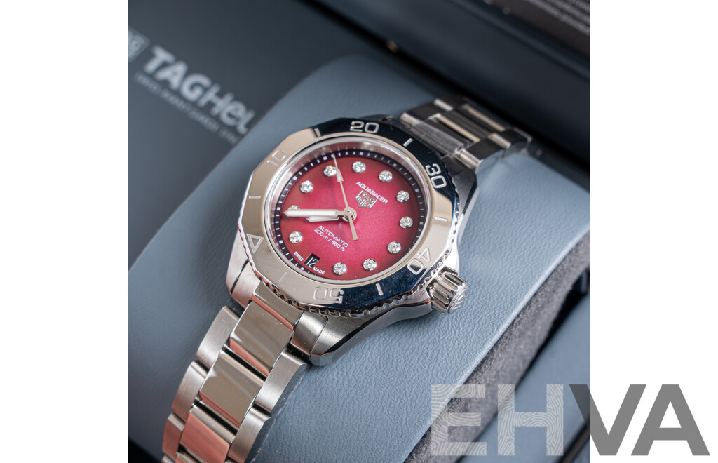 Brand New Tag Heuer 30mm Aquaracer Professional 200 Date with Mother of Pearl and Diamond Face. Model WBP2414.BA0622