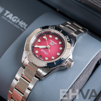 Brand New Tag Heuer 30mm Aquaracer Professional 200 Date with Mother of Pearl and Diamond Face. Model WBP2414.BA0622